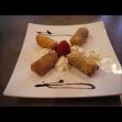 Deep Fried Banana with Crushed Cashews and Icing Sugar Dessert